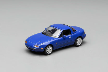 Blue model car on a gray background