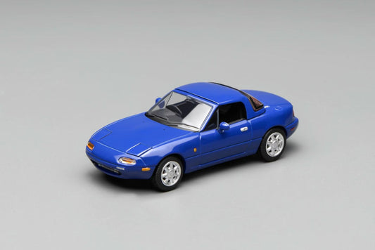 Blue model car on a gray background