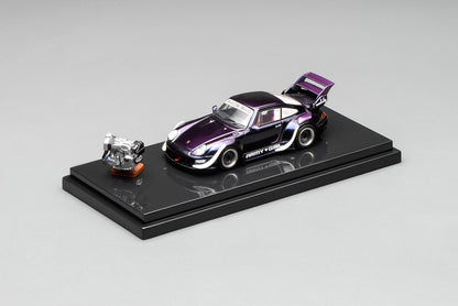 Model car on a black platform with a gray background