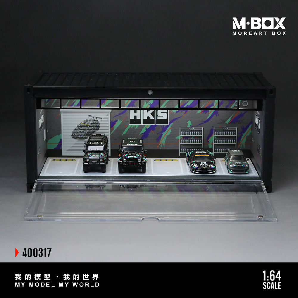 Model car display case with HKS branding and 'M-BOX' branding.