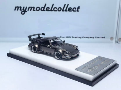 Model car on display with 'mymodelcollect' branding in the background