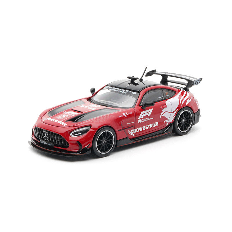 Red and black model car with branding on a white background