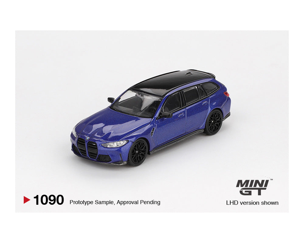 Blue model car on a white background with 'MINI GT' branding.