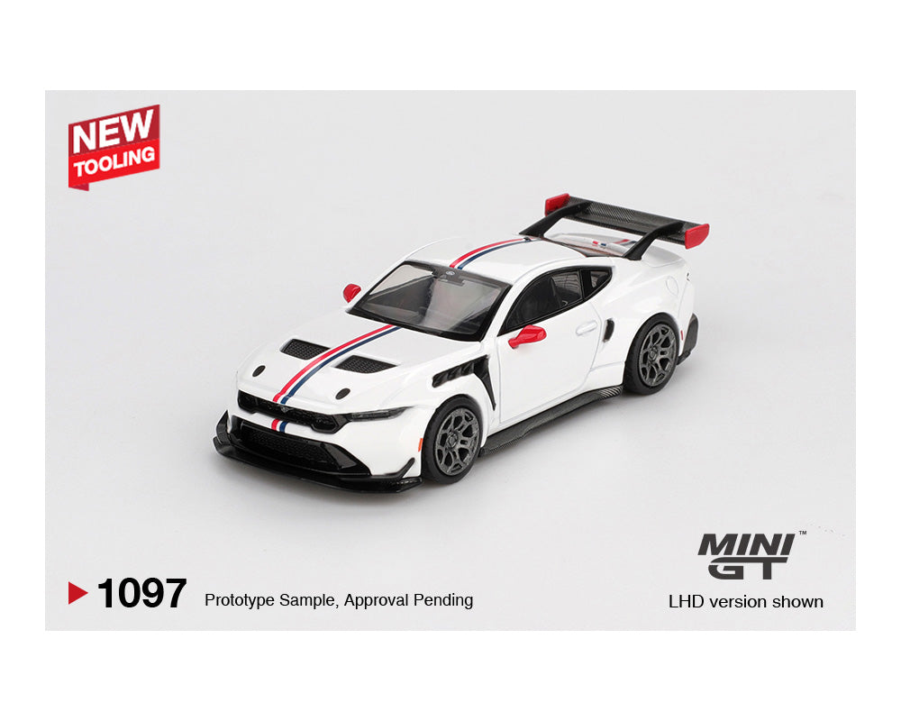 White racing car model with red accents on a gray background, featuring the Mini GT brand.