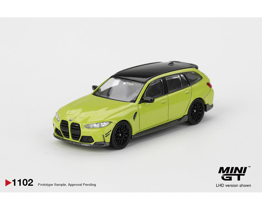 Model car of a lime green BMW with black roof on a white background, featuring the MINI GT logo.