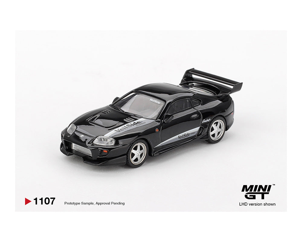 Black model car on a white background with 'MINI GT' branding.