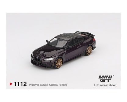 Model car of a BMW on a white background with 'MINI GT' branding.