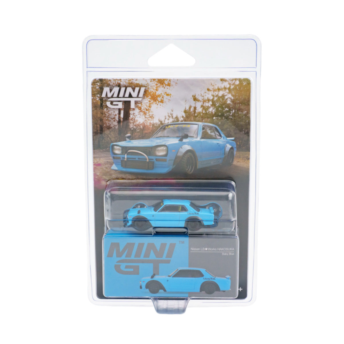 MINI GT diecast model car in its original blister pack packaging, featuring a light blue Toyota 2600 Z-Force.