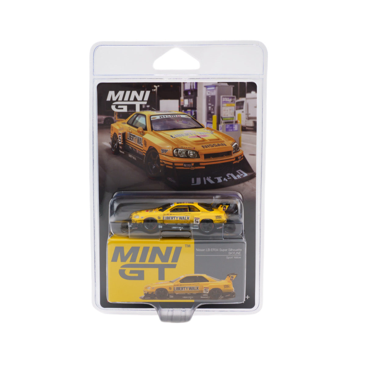 MINI GT toy car package featuring a small yellow Nissan Skyline R32 race car with sponsor decals, displayed in a clear blister pack with branded backing card and box on a white background.
