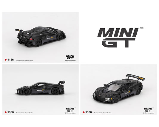 Three Mini GT Chevrolet Corvette Z06 GT3.R Road America Test car Black in white background