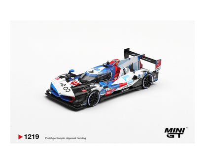 Model racing car with a colorful design on a white background, featuring the MINI GT logo.