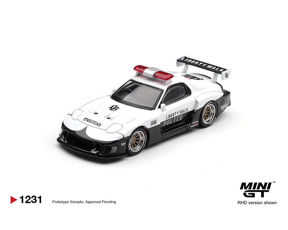 Model police car with white and black design on a white background, featuring the Mini GT logo.