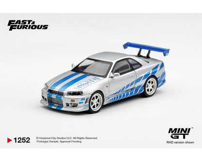 Mini GT 1:64 Fast & Furious Nissan Skyline GT-R R34 Silver MGT01252-BL diecast model car with blue racing graphics, white wheels and rear wing
