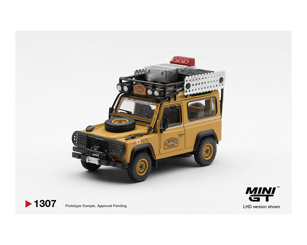 Model toy car resembling a Land Rover on a white background with 'MINI GT' branding.