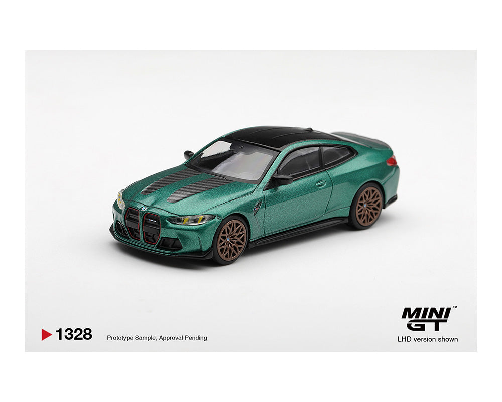 Model car of a green and black sports car on a white background with 'MINI GT' branding.