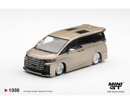 MINI GT MGT01335-BL Toyota Vellfire Z Premier Modellista 1:64 diecast model in Precious Metal, shown from a front left three-quarter view with the Modellista body kit, lowered stance, multi-spoke wheels, panoramic sunroof and authentic Toyota detailing.