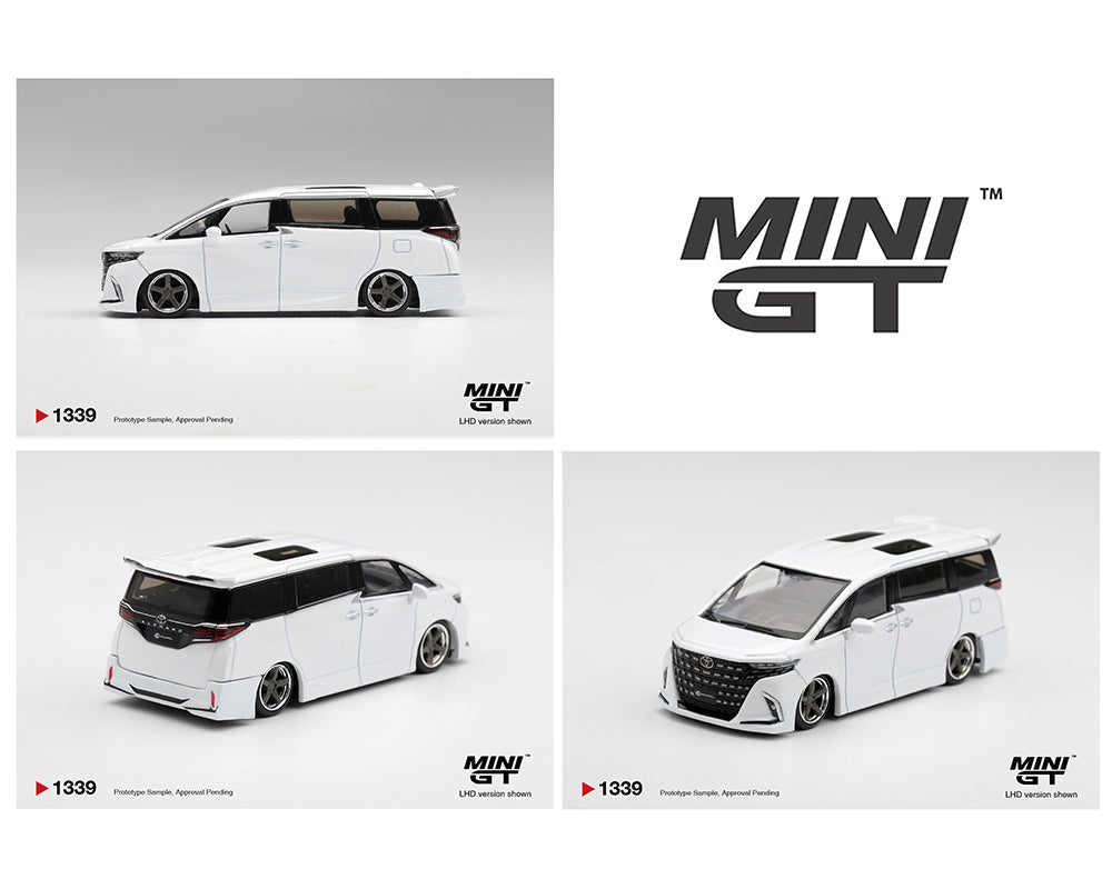 MINI GT 1:64 Toyota Alphard in pearl white with a lowered stance, custom body kit, black grille, silver deep-dish wheels, dual sunroofs, and rear spoiler. Product code MGT01339-BL. Prototype diecast model shown from side, front, and rear three-quarter views.