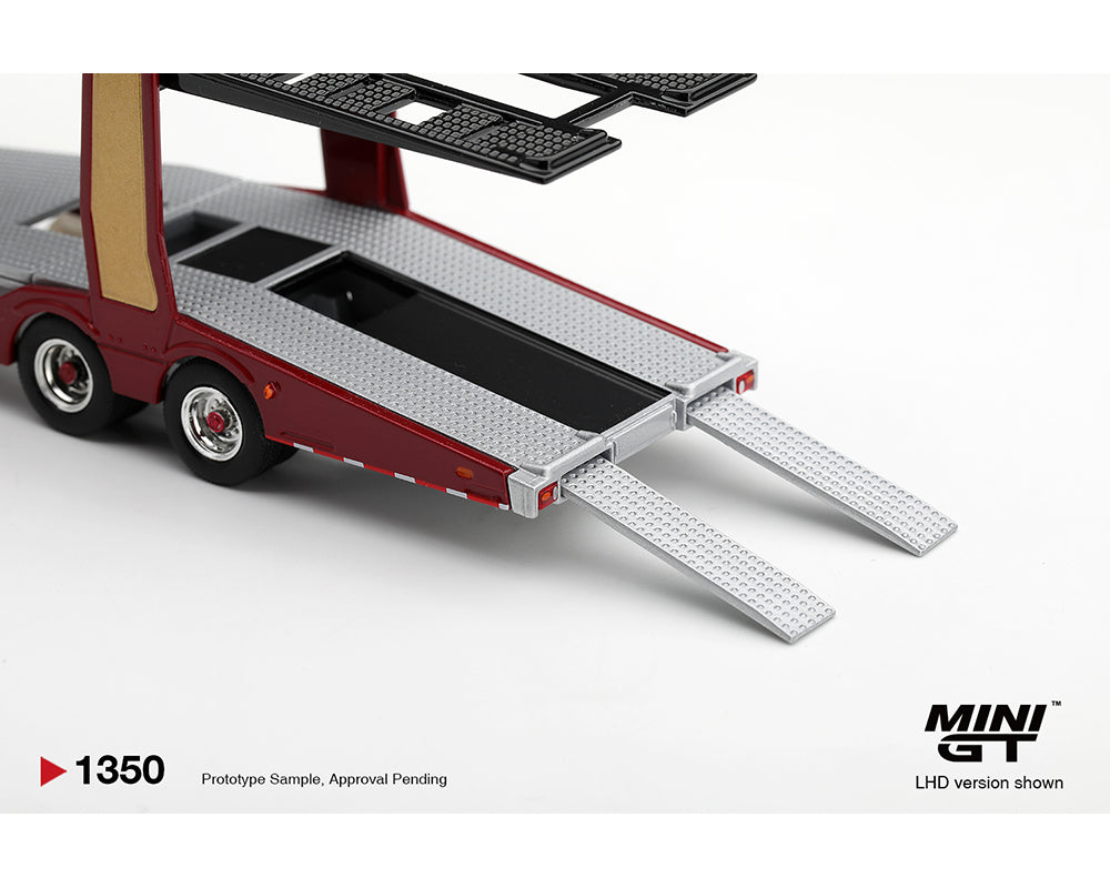 A miniature model of a double-decker car carrier trailer, shown in a red and beige livery with silver ramps deployed, on a white background. The 'MINI GT' brand logo is visible in the bottom right corner.