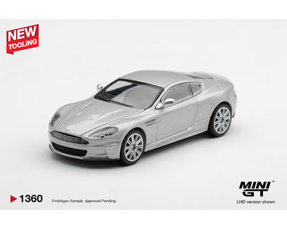 A silver metallic Mini GT model car, specifically an Aston Martin DB9 replica, shown on a white background with promotional text overlays.