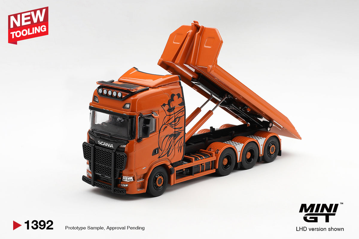 MINI GT 1:64 Scania orange flatbed recovery truck diecast model MGT01392 with raised tilting bed, hydraulic lift, black bull bar and custom graphics, front three-quarter view