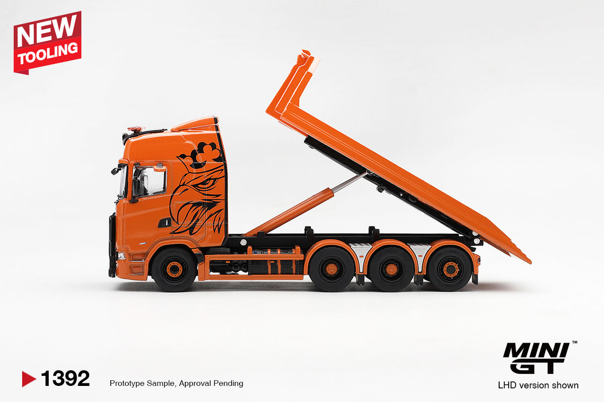 MINI GT 1:64 Scania orange flatbed recovery truck diecast model MGT01392 with raised tilting loading bed, hydraulic lift system and custom black graphics