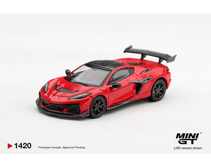 MINI GT 1:64 Chevrolet Corvette ZR1 Red diecast model car MGT01420-BL, front three-quarter view featuring carbon fiber hood accents, black wheels, aggressive front splitter, side air intakes, and large rear wing.