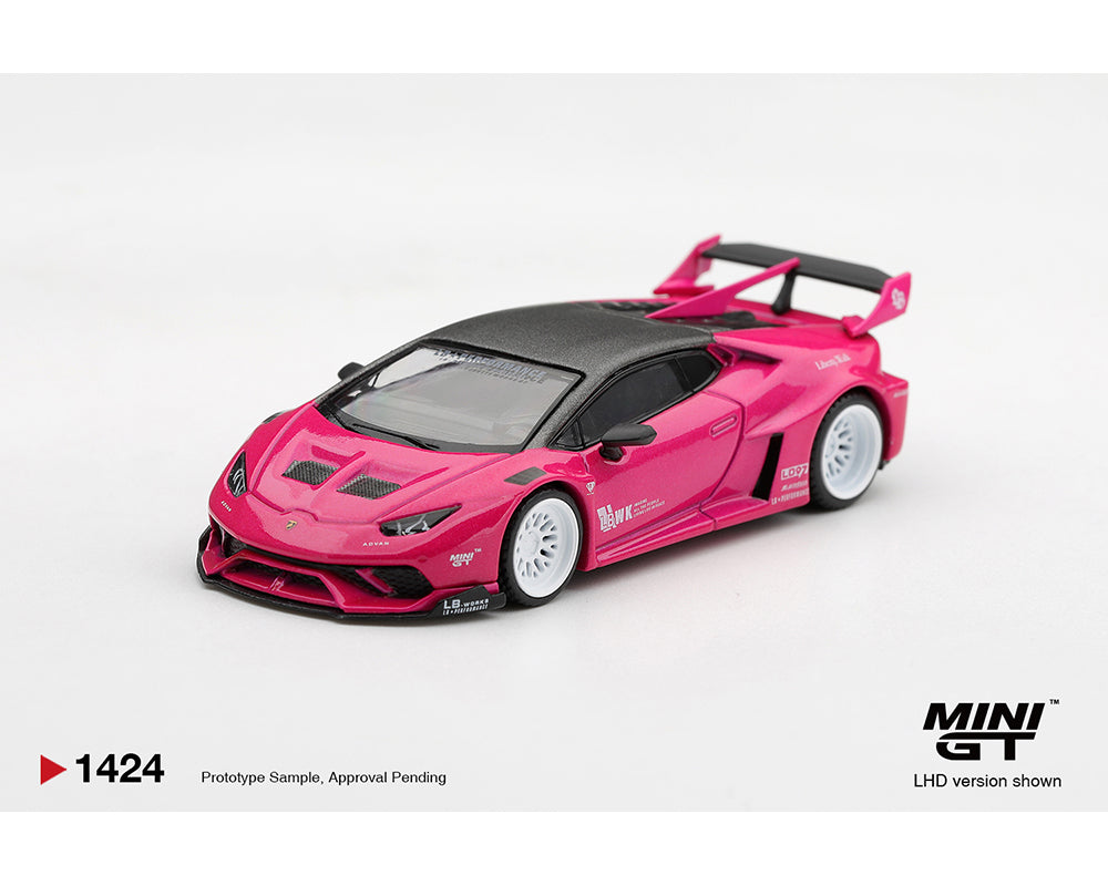 MINI GT 1:64 LB-WORKS Lamborghini Huracán GT Pink diecast model MGT01424-BL, front three-quarter view featuring Liberty Walk widebody kit, black carbon fiber roof, white racing wheels, aggressive front splitter, hood vents, and large rear wing.