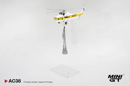 Model helicopter with a yellow and black design on a white background, featuring the Mini GT brand.