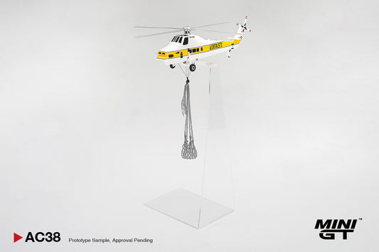 Model helicopter with a yellow and black design on a white background, featuring the Mini GT brand.