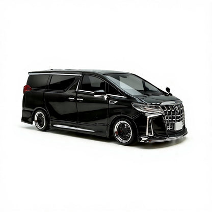 Black Toyota Alphard minivan on a white background