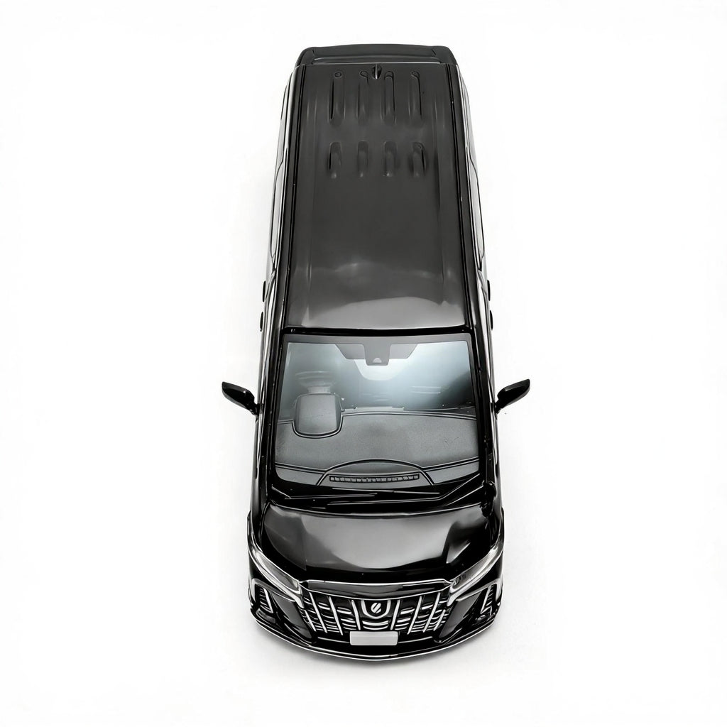 Top-down view of a black car on a white background
