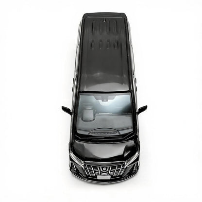 Top-down view of a black car on a white background