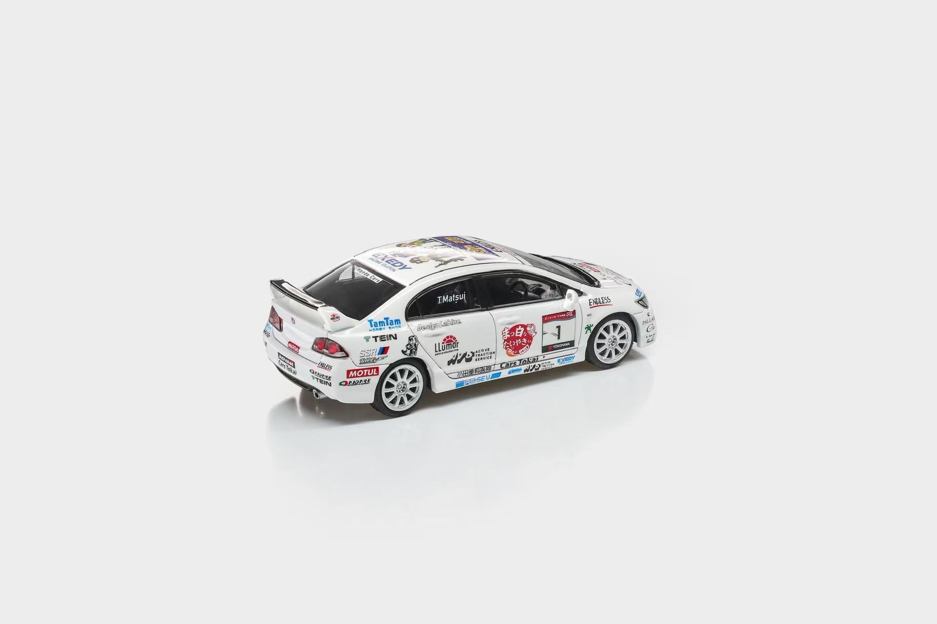 Model car with various sponsor logos on a white background