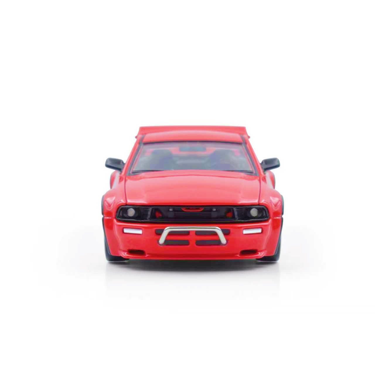 Red toy car on a white background
