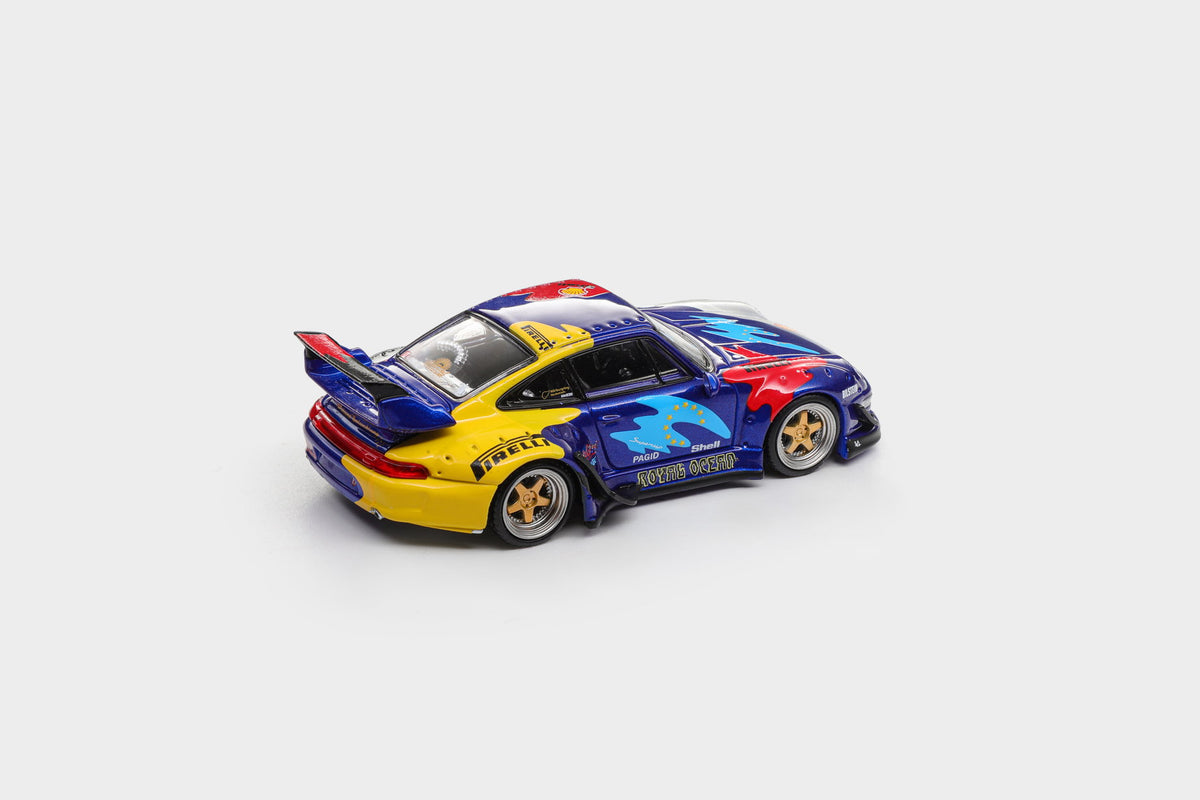 Model Model 1:64 RWB 993 Royal Ocean Porsche 911 diecast model rear three-quarter view with blue, yellow and red racing livery, gold wheels and rear wing, MM64-RWB993-016