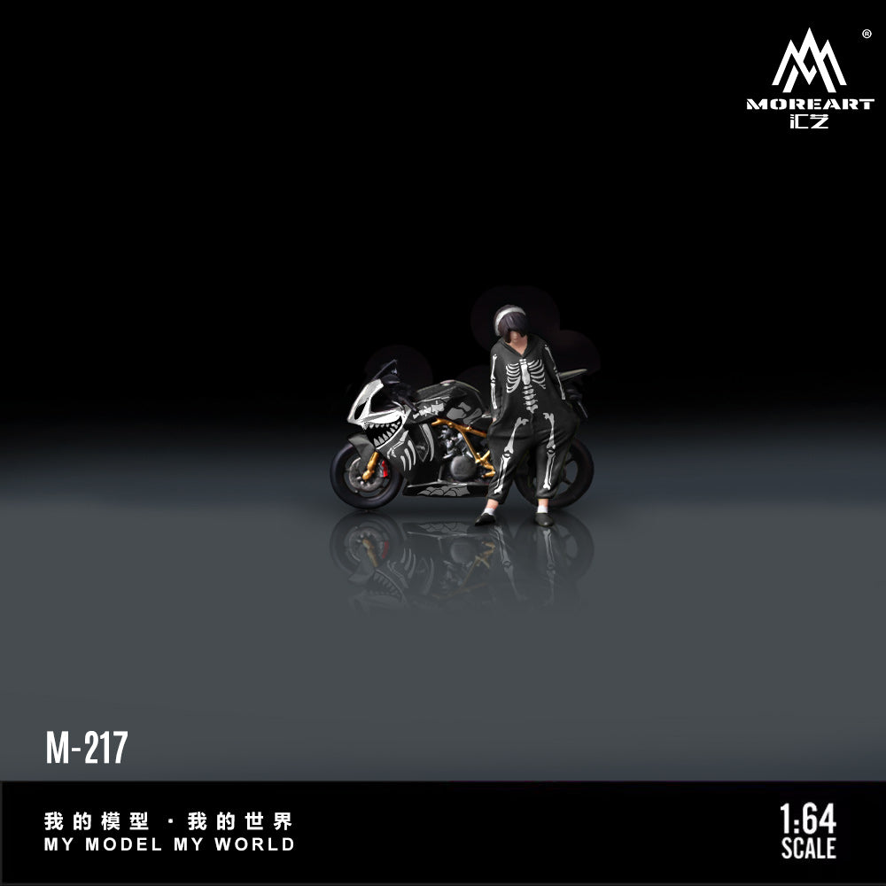 Model figure of a person in a helmet and suit next to a motorcycle on a reflective surface with 'MOREART CZ' branding.