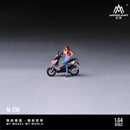 MoreArt 1:64 Hello Kitty Pink Motorcycle Heart Hand Sweet Girl Figure Set M-239 displayed in a lifestyle scene featuring a female figure with a pink Hello Kitty scooter, designed for 1:64 scale diecast model car dioramas and miniature displays.