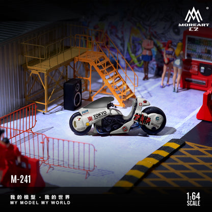 Model motorcycle on a detailed miniature set with stairs and colorful background, featuring the brand 'MoreArt CZ'.
