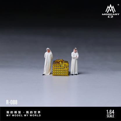 Two miniature figures in white robes standing next to a gold and black box on a gray background with 'MOREART' branding.