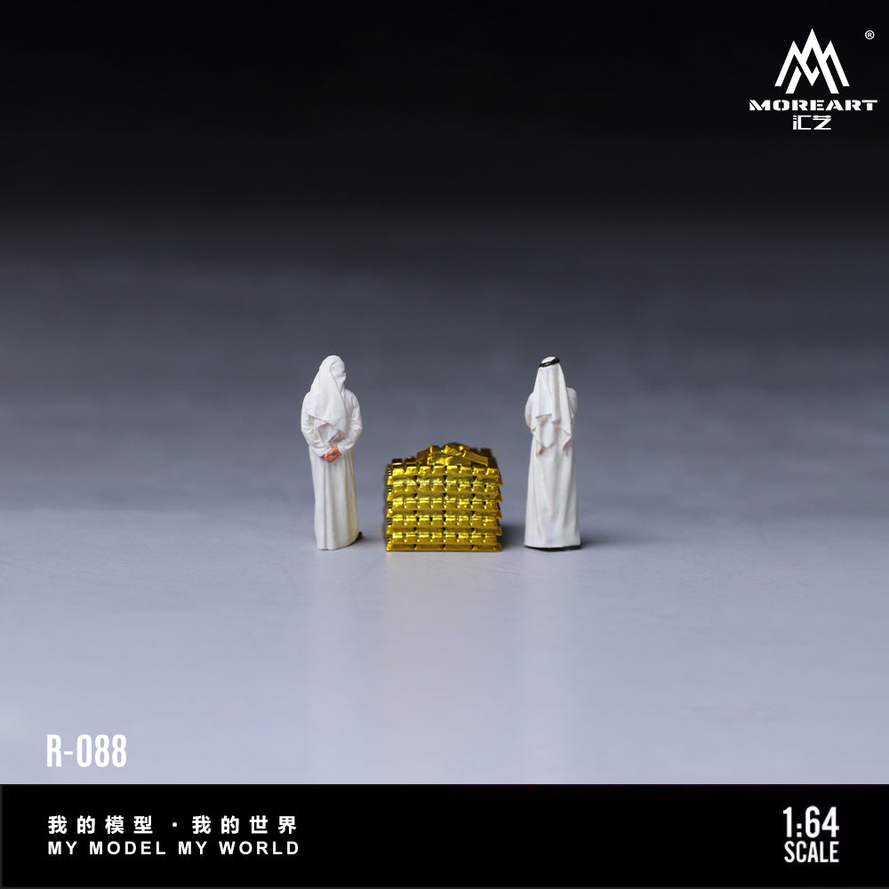 Two white figures standing on a gray surface with a gold block between them, branded 'MOREART CZ'.