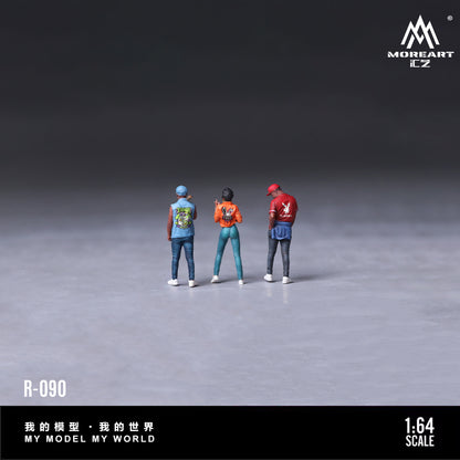 Model figures of three people in street fashion, featuring the brand 'MoreArt'.