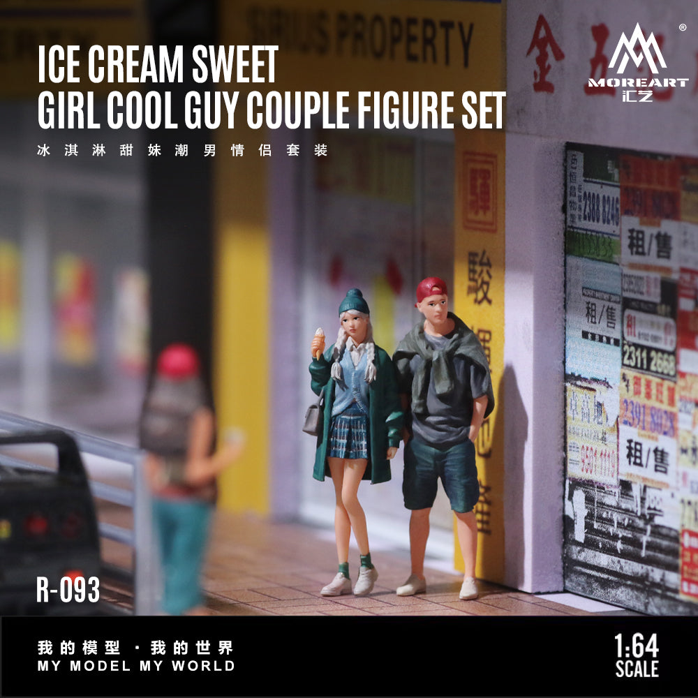 Model figure set of a girl and a guy on a street with signs in the background, labeled 'Ice Cream Sweet Girl Cool Guy Couple Figure Set'.