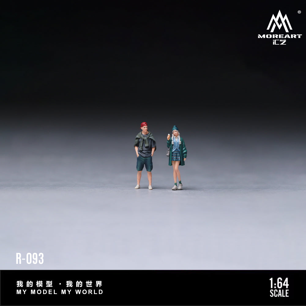 Two miniature figures on a gray surface with 'MOREART' branding.