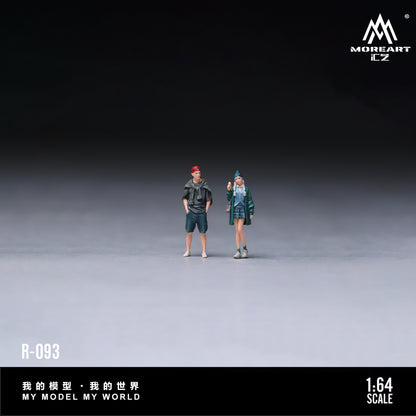 Two miniature figures on a gray surface with 'MOREART' branding.