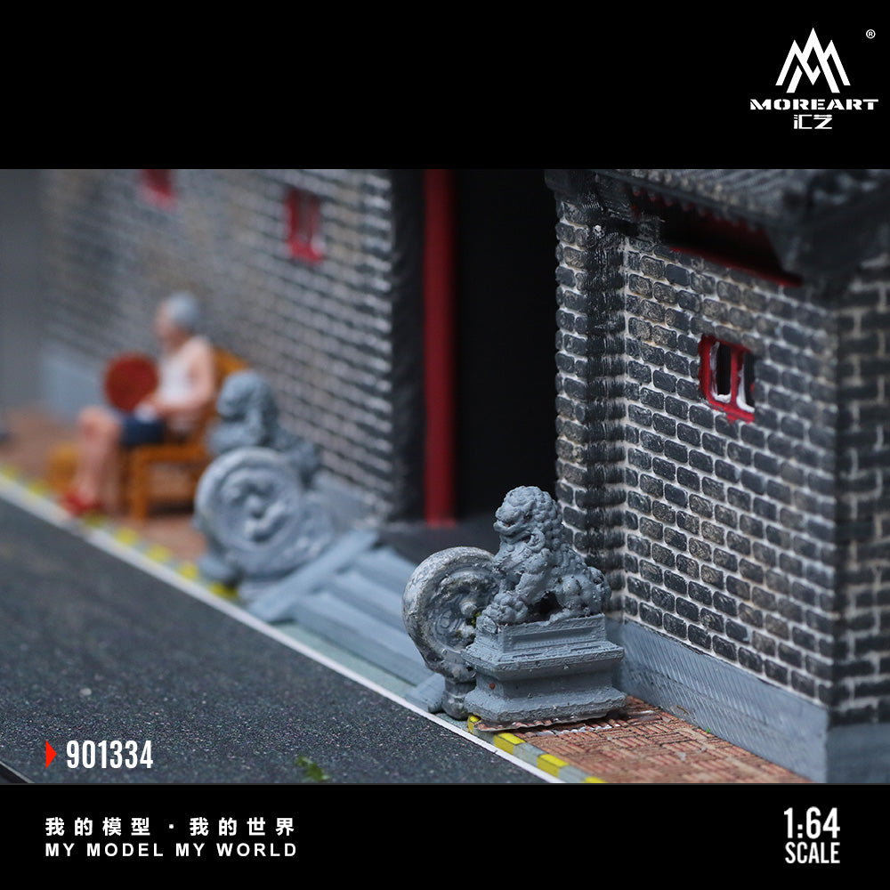 Model of a street scene with buildings and people, featuring MoreArt logo.