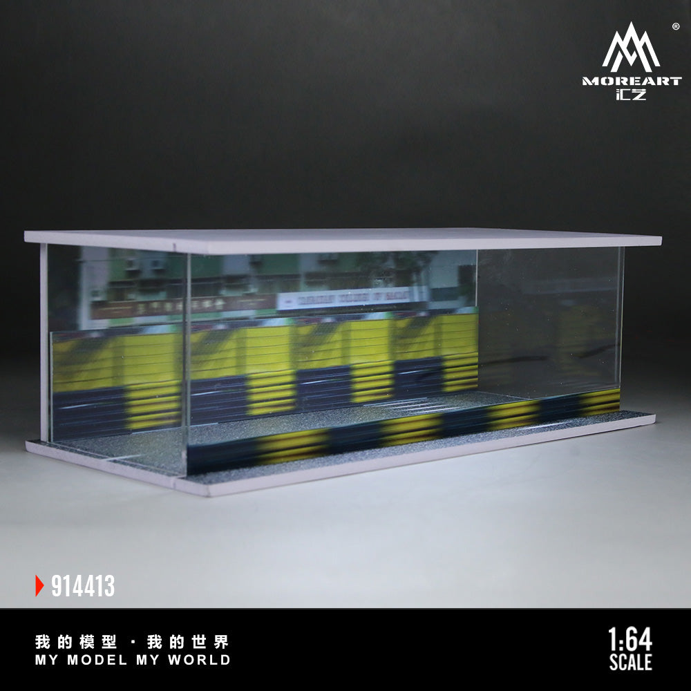 Model diorama with transparent walls, showcasing a detailed interior with yellow and black elements. Moody lighting, MoreArt branding, 1:64 scale.