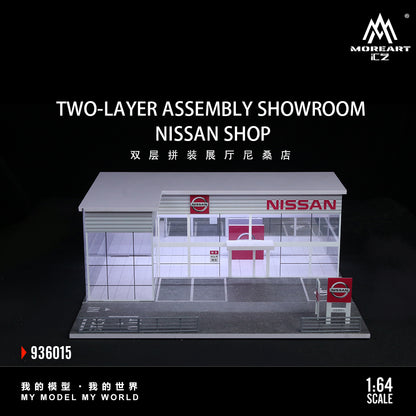 Model of a two-layer assembly showroom with Nissan branding on a black background