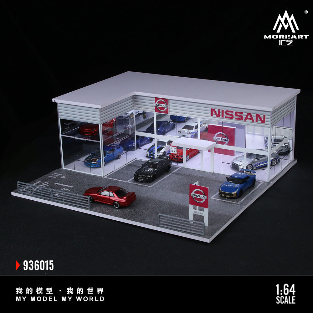 Model of a Nissan car showroom with multiple cars displayed, featuring the MoreArt CZ brand.