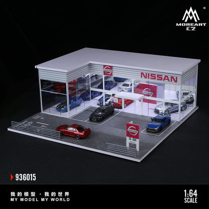 Model of a Nissan car showroom with multiple cars displayed, featuring the MoreArt CZ brand.