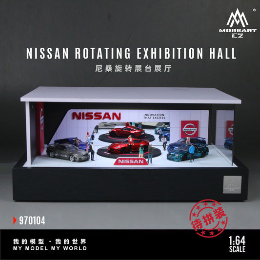 Model of a Nissan rotating exhibition hall with cars and people on a gray background